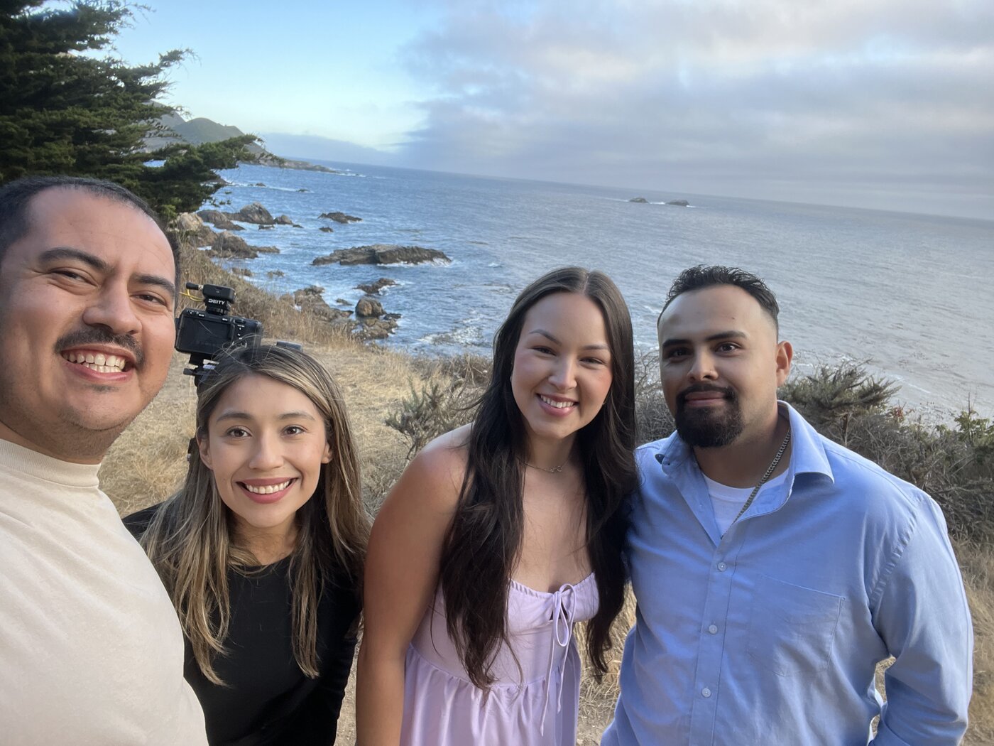 Drew and Jackie with engaged couple coastal