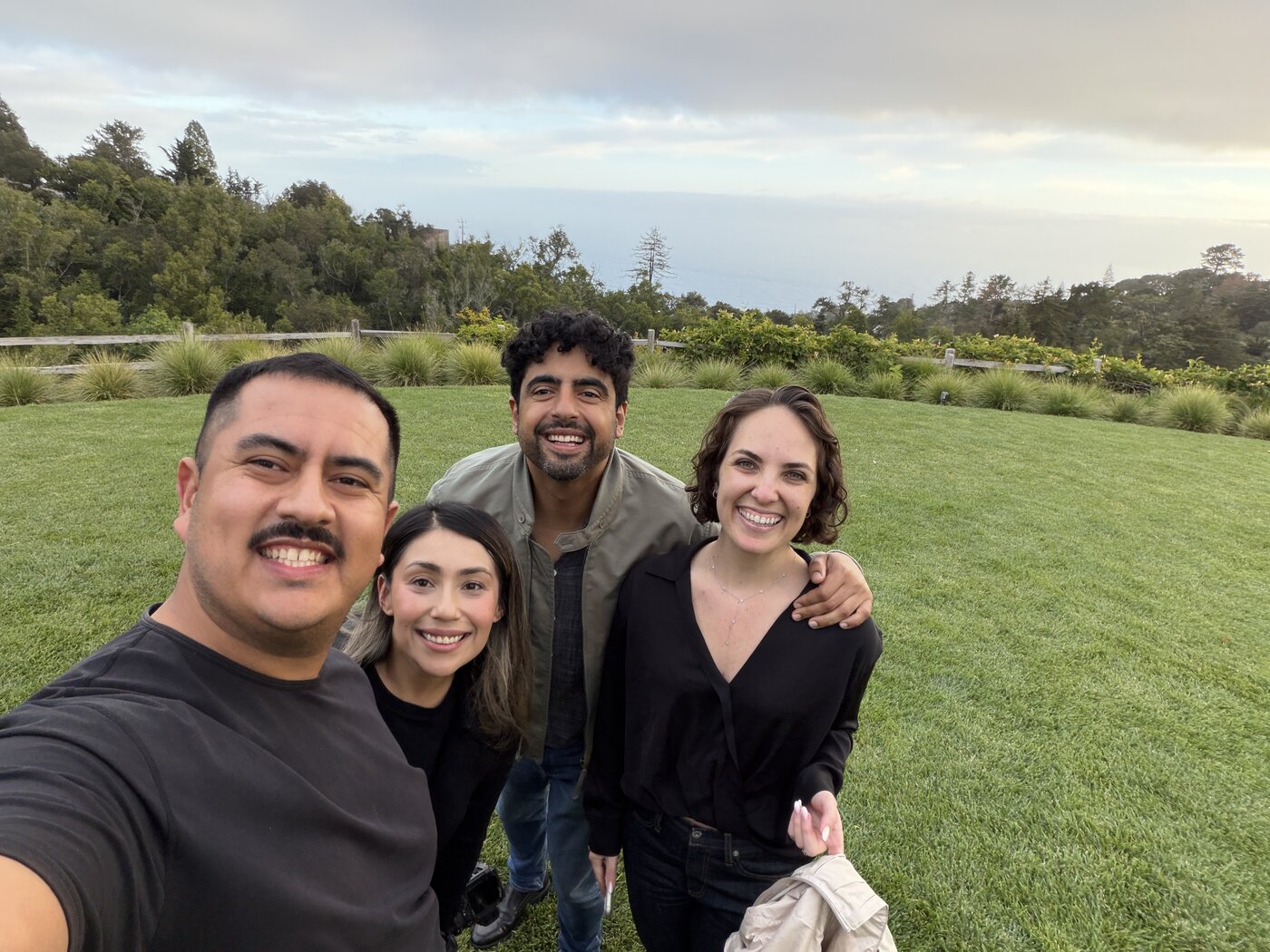 Drew and Jackie with couple in grass